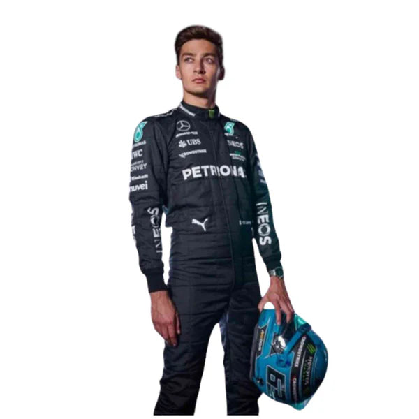 Person wearing a racing suit with various sponsor logos on a white background