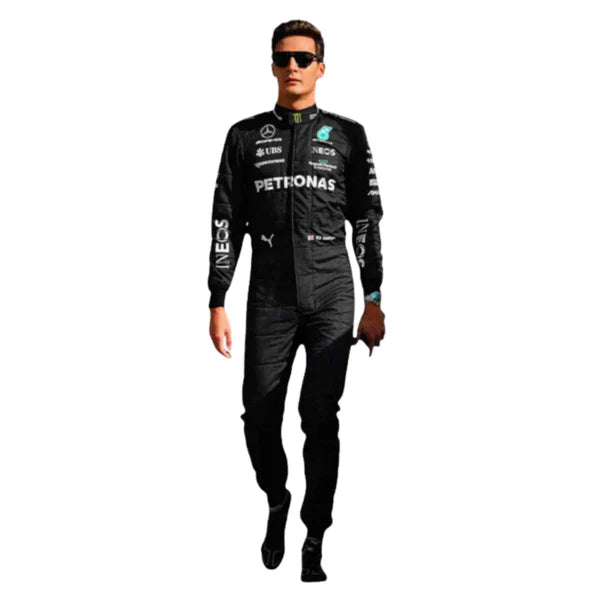 Person wearing a black racing suit with sponsor logos on a white background