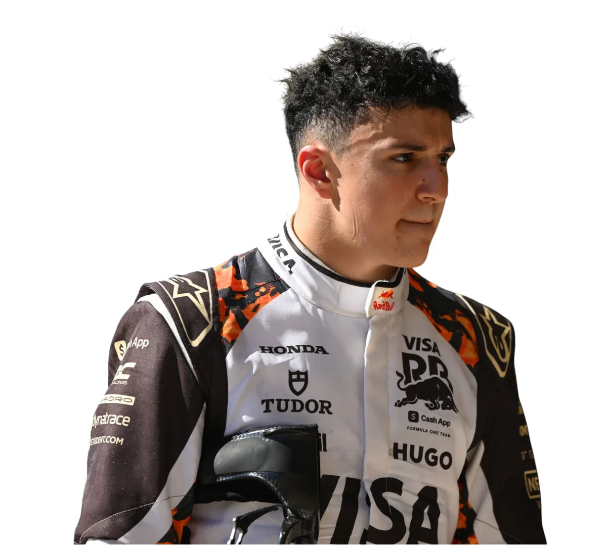 Person wearing a racing suit with various sponsor logos on a white background