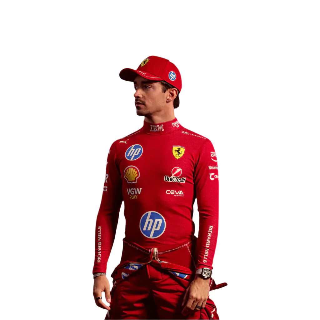 Person wearing a red racing suit with various sponsor logos on a white background